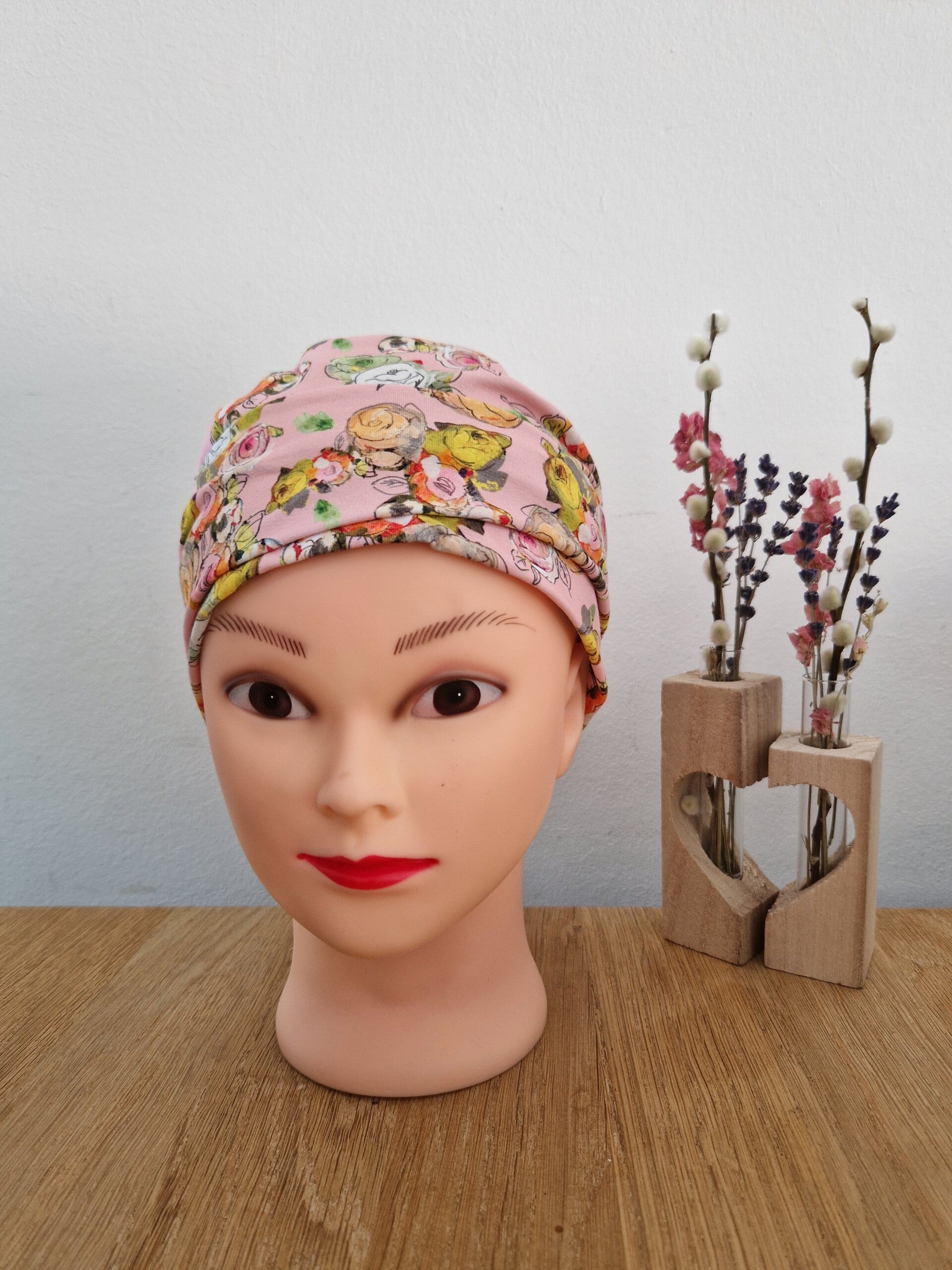 Plooimutsje roze bloemen
