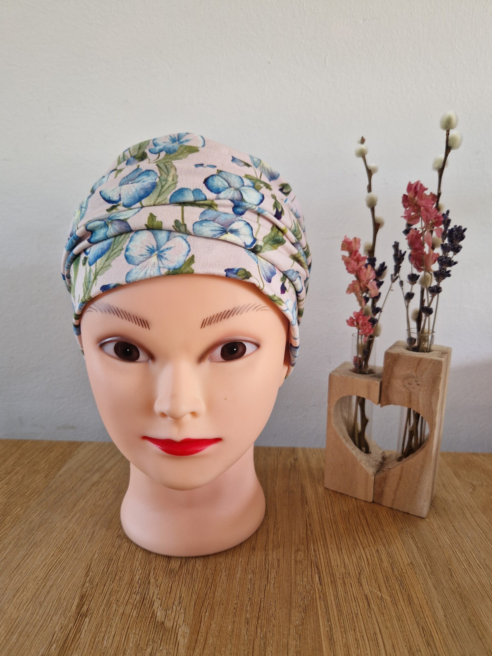 Plooimutsje blauwe bloem viscose