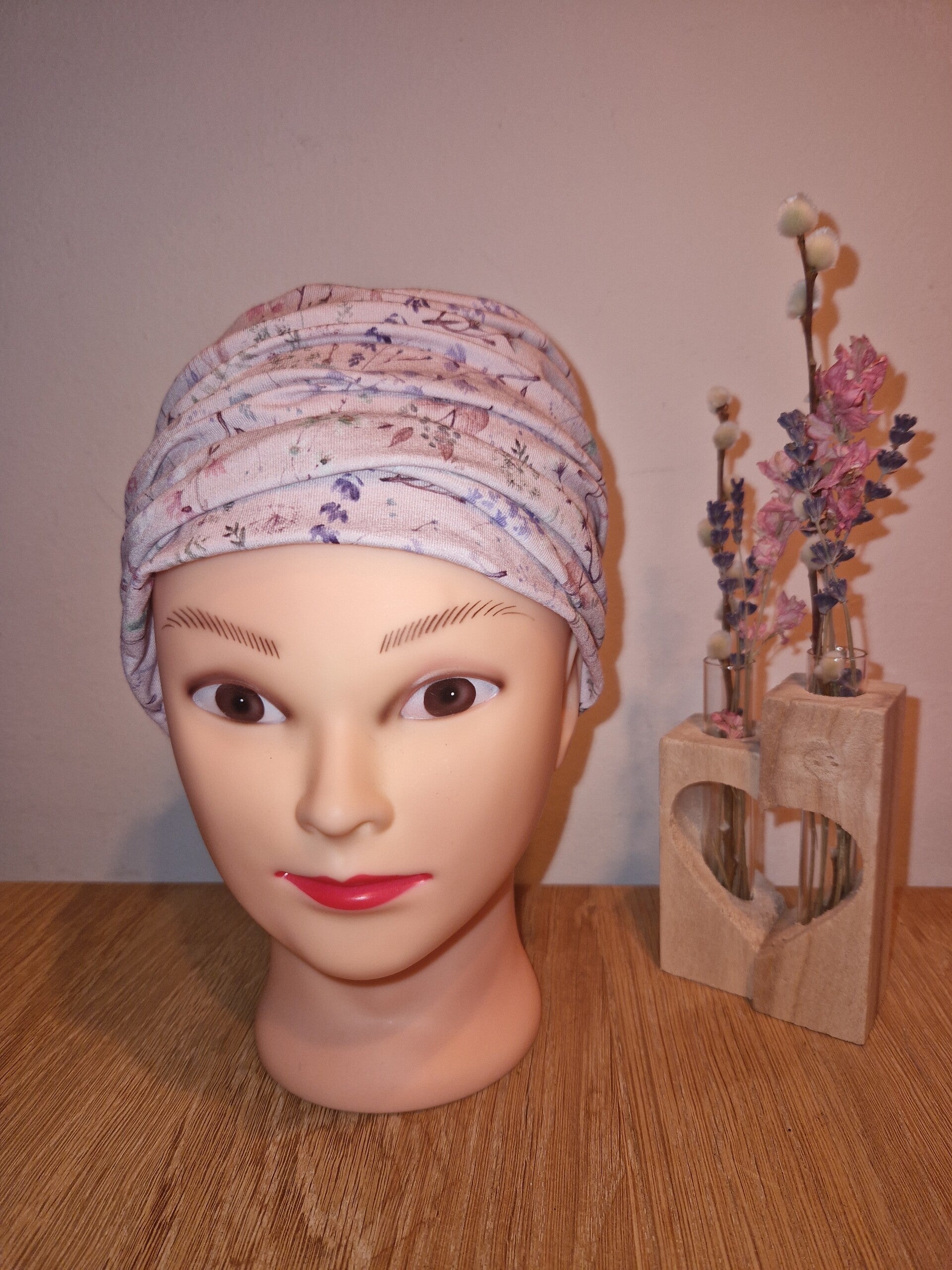 Plooimutsje viscose roze bloem
