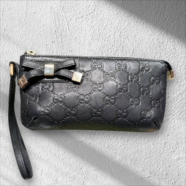 GUCCI Guccissima Leder Wristlet Clutch mit Schleife