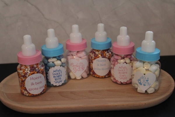 Geboorte traktatie babyflesjes