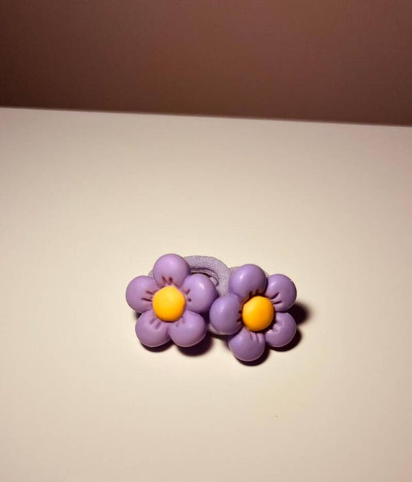 Elastiekjes bloem paars