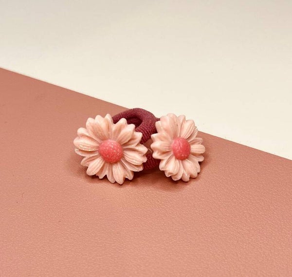 Elastiekjes Madelief roze glitter