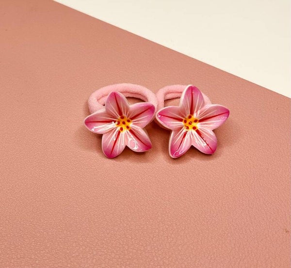 Elastiekje tropische bloem donker roze