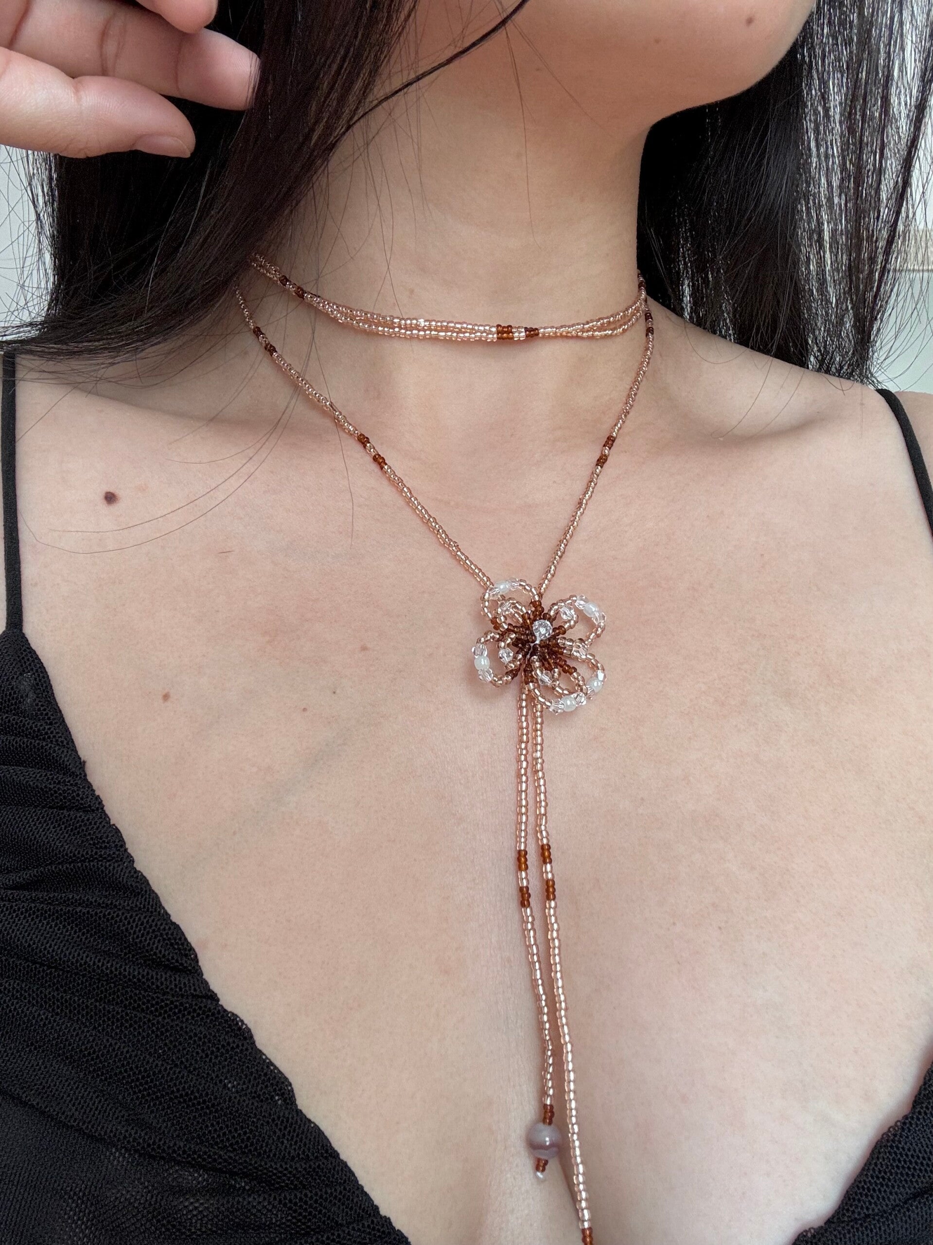 Brown and golden beaded necklace