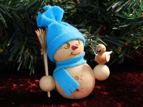 "Schneemann mit Vogel"