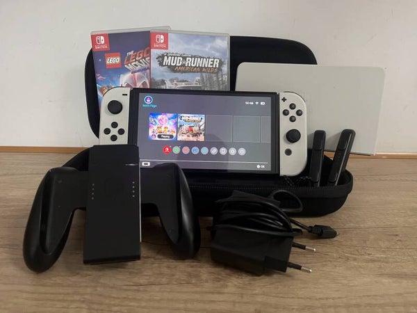 Nintendo Switch OLED + 2 gry LEGO Movie MudRunner + case