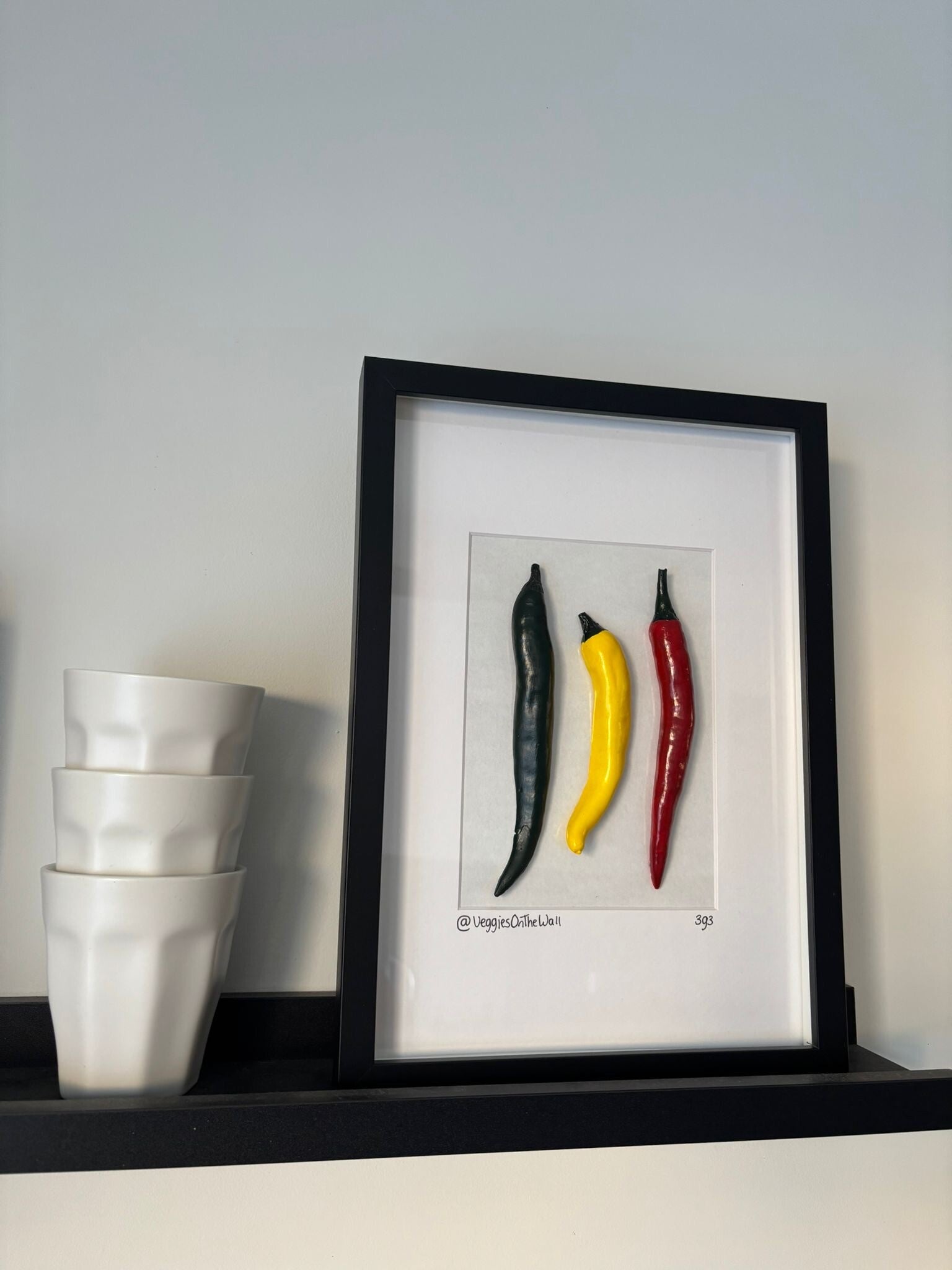 Drie gekleurde pepers 393