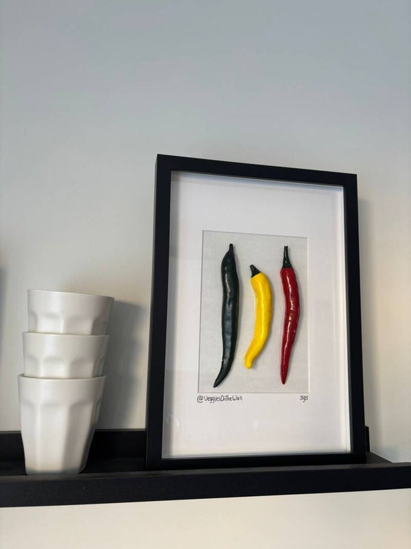 Drie gekleurde pepers 393