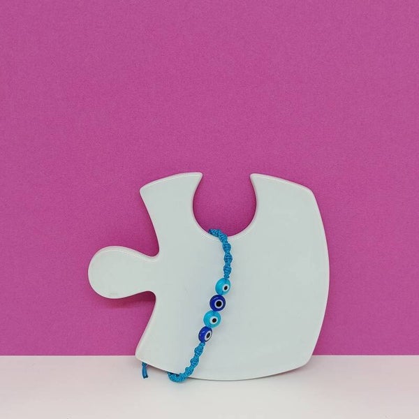 Bracelet tissé main avec 3 perles œil en verre turquoise et bleu marine porte-bonheur – Triozélis