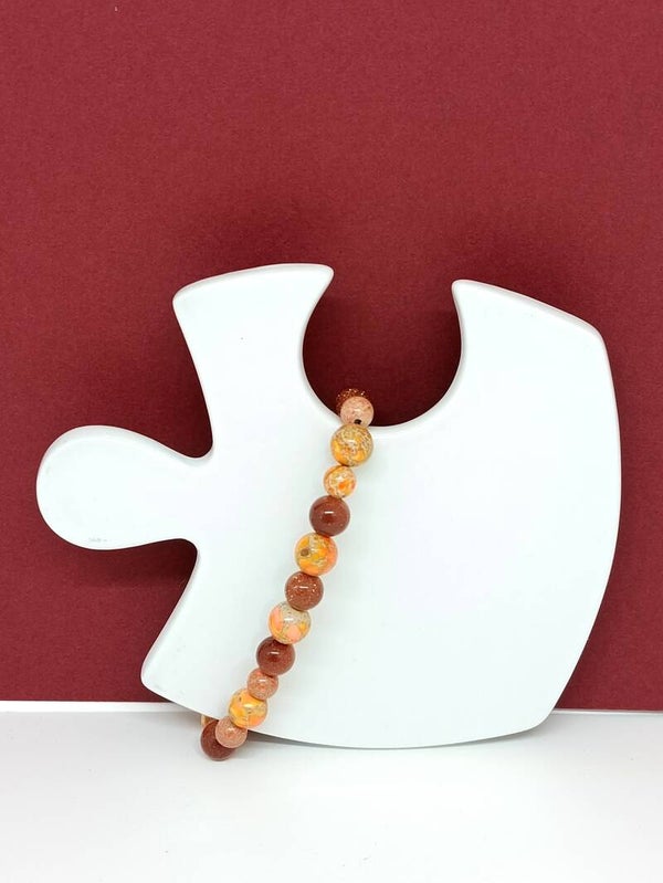 Bracelet artisanal jaspe impérial orange et pierre scintillante dorée – Feu d’Astre