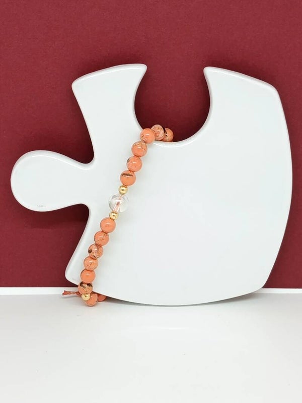 Bracelet Aqua Aura, Howlite coquillage orange et hématite – Bracelet pierres naturelles – Douceur solaire, harmonie et lumière – Création artisanale  Brise orangée