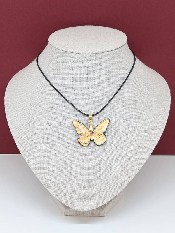 Pendentif papillon Doré x