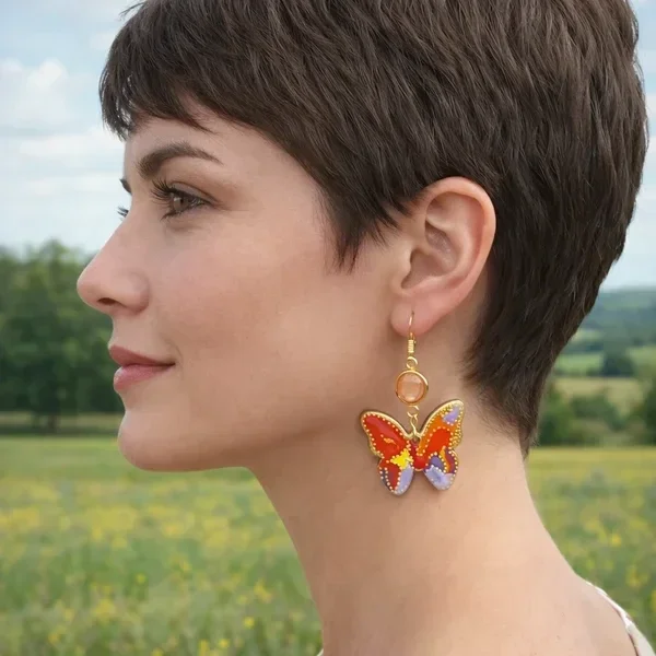 Boucles d’oreilles papillon orange et mauve en bois artisanales | Art’Tipik- Ephémère