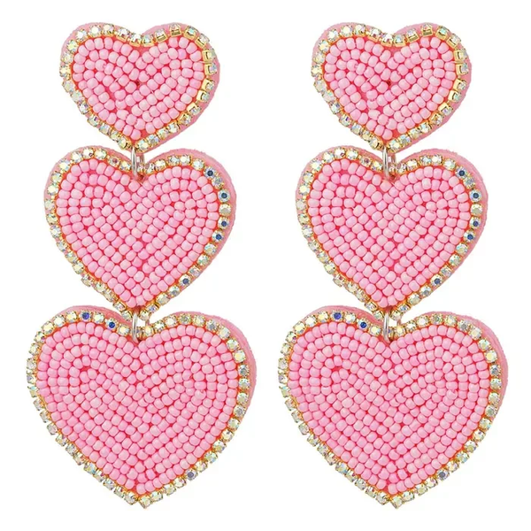 Oorbellen three light pink hearts