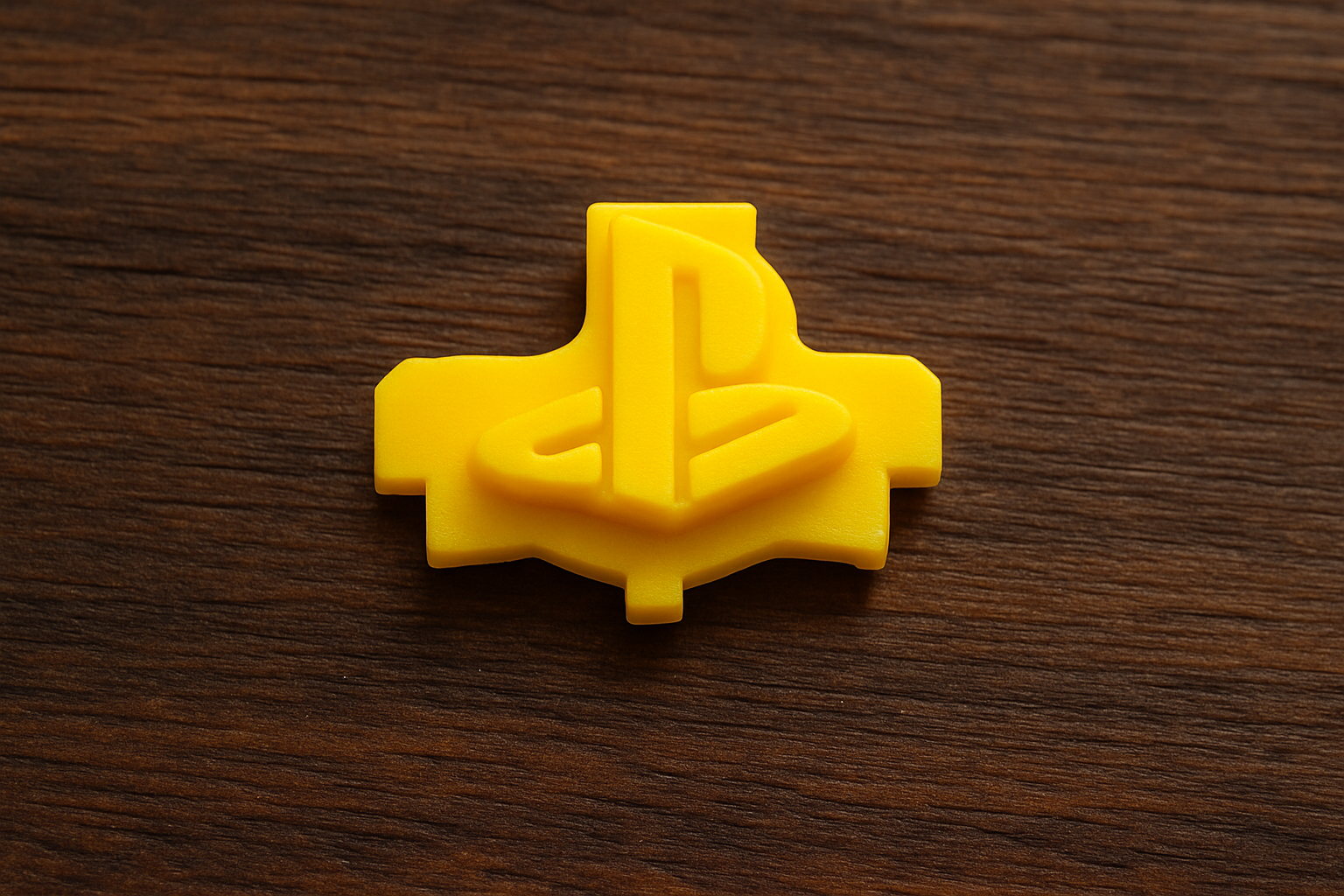 Playstation logo knop geel
