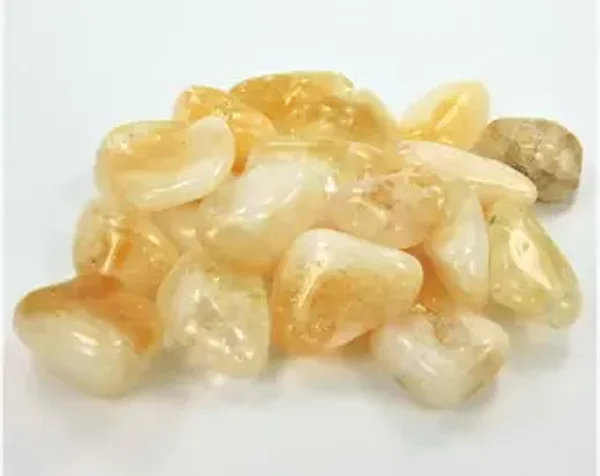 citrine /pierre roulée/richesse/motivation/créativité/concentration/confiance en soi/associé à l'Archange Gabriel