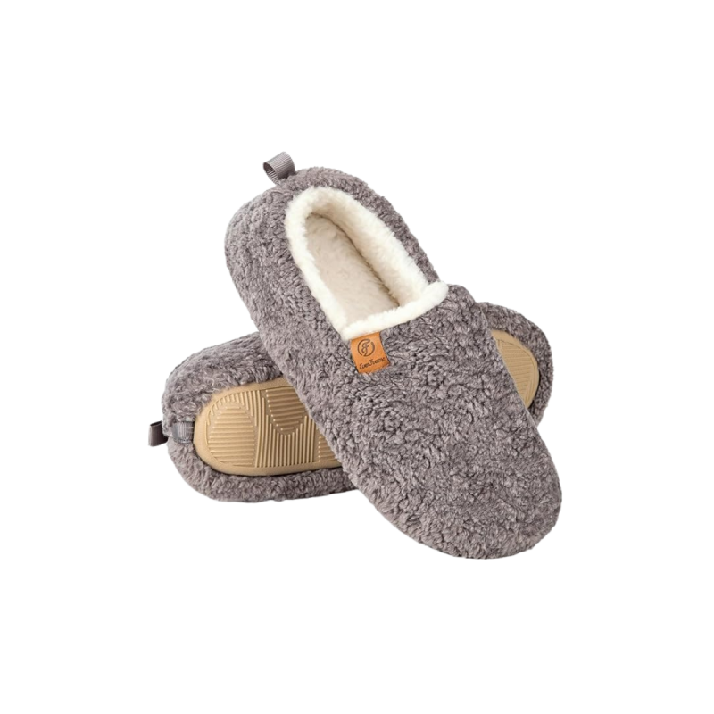 Soft, neutral slippers placed on a clean floor, representing comfort and ease at home.
