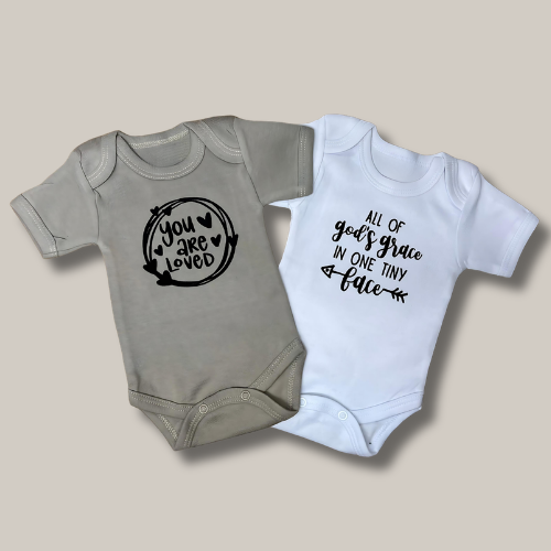 twee-romper-wit-en-beige-met-you-are-loved-en-all-of-gods-grace-standard.png