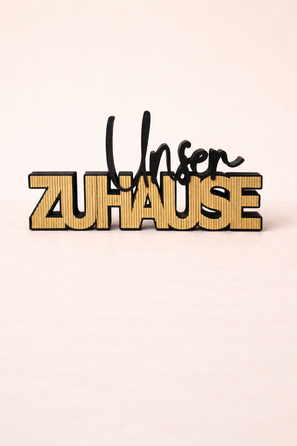 Schriftzug "Unser Zuhause"