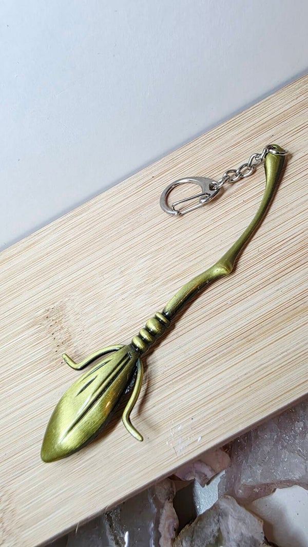Gouden bezem sleutelhanger