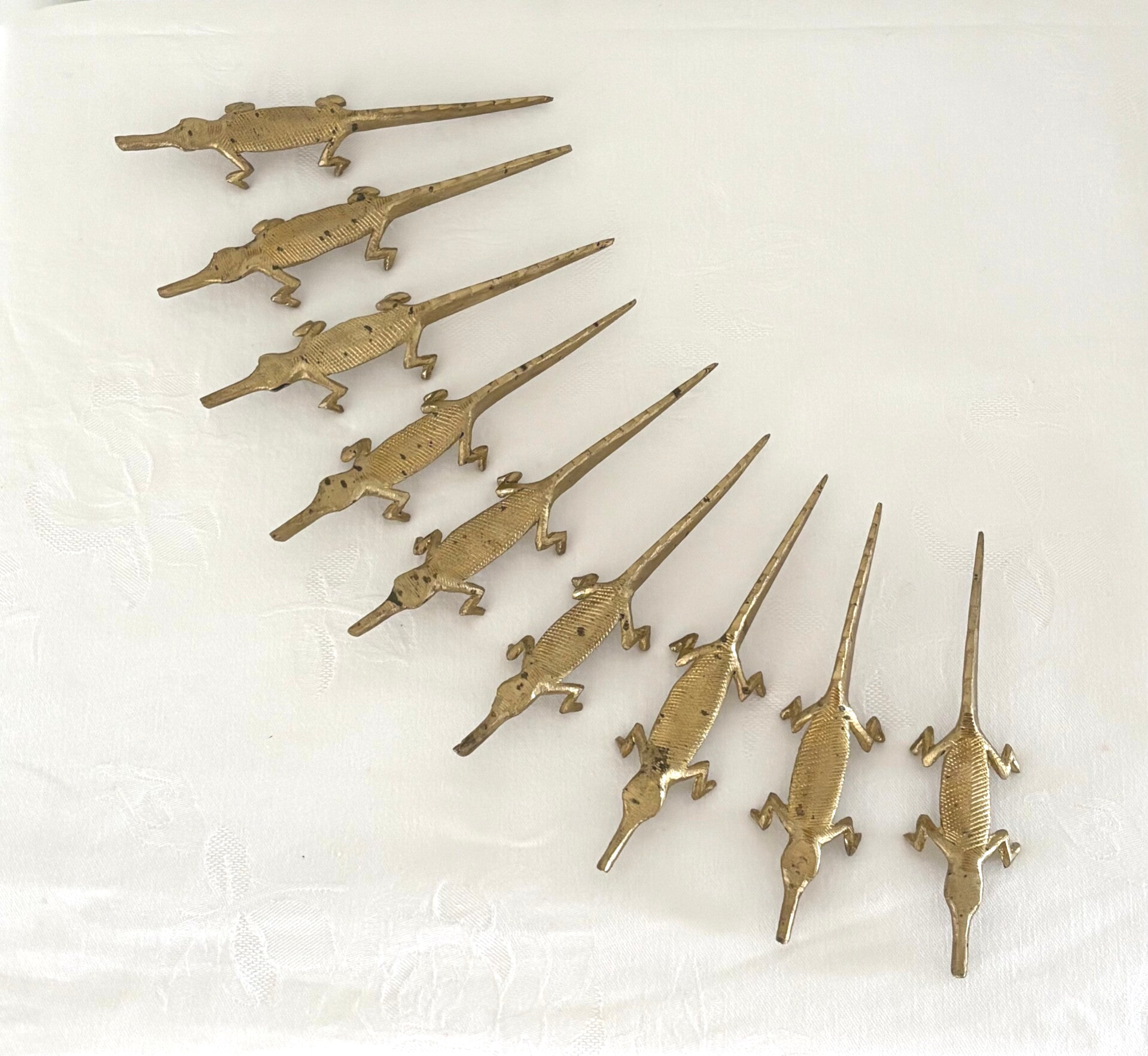 9 Messing messenleggers - 9 Brass knife rests