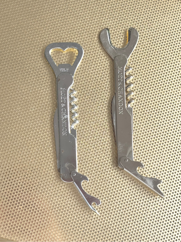 2 Vintage Moët & Chandon flesopeners - 2 Vintage Moët & Chandon bottle openers