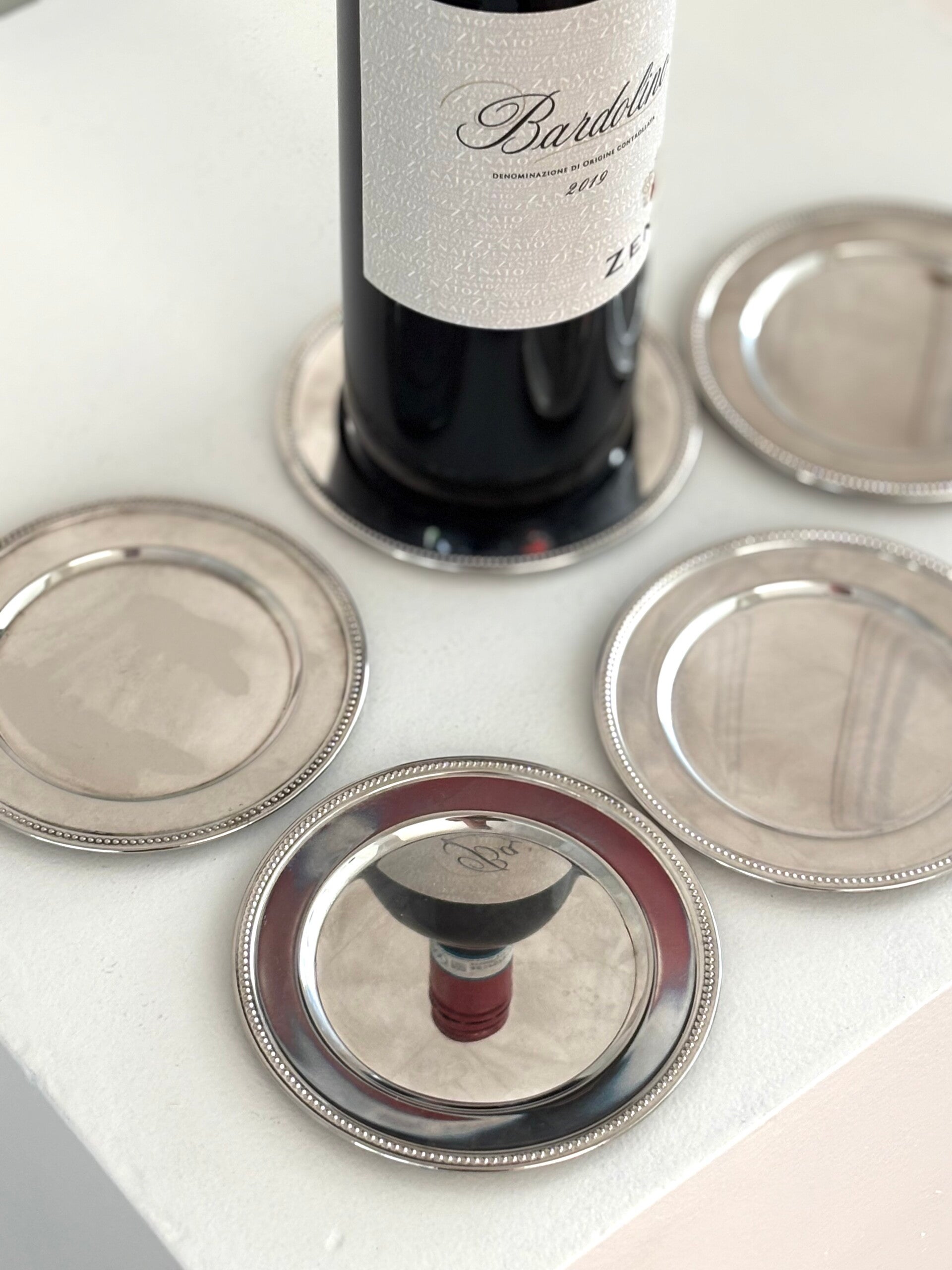 Verzilverde flesonderzetter - Silver-plated bottle coaster