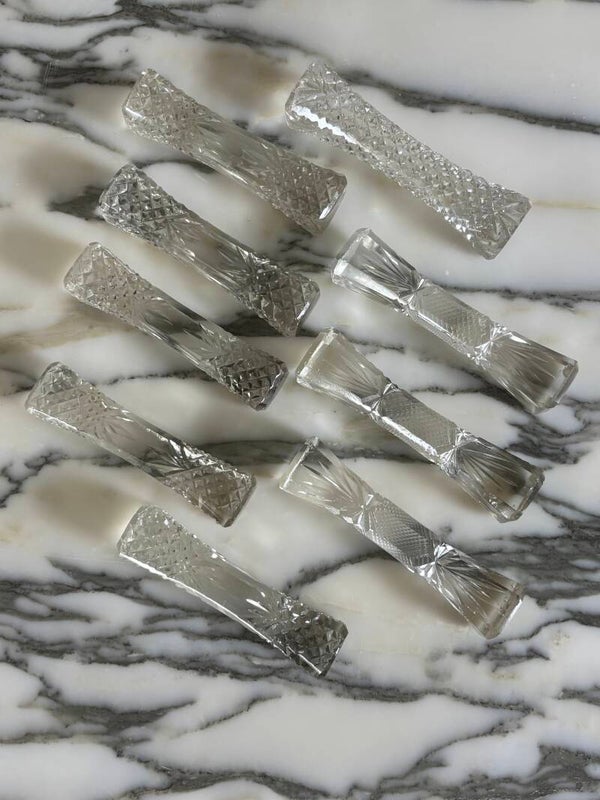 9 Kristallen messenleggers - 9 Crystal knife rests