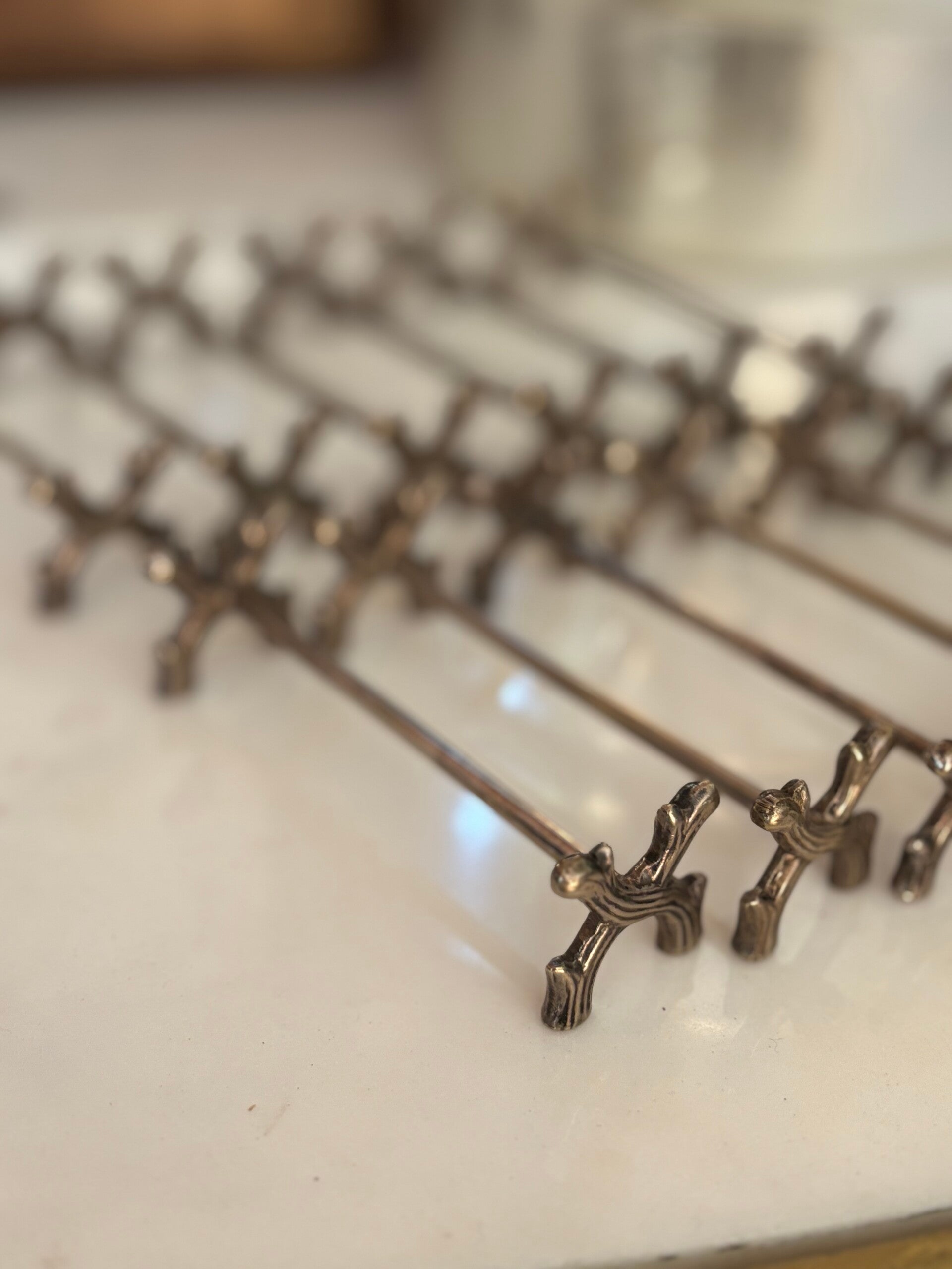 12 Verzilverde messenleggers - 12 Silver-plated knife rests