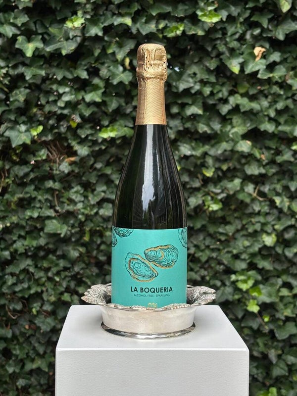 Verzilverde Champagnefleshouder met sierrand - Silver-plated Champagne bottle holder features a festive border