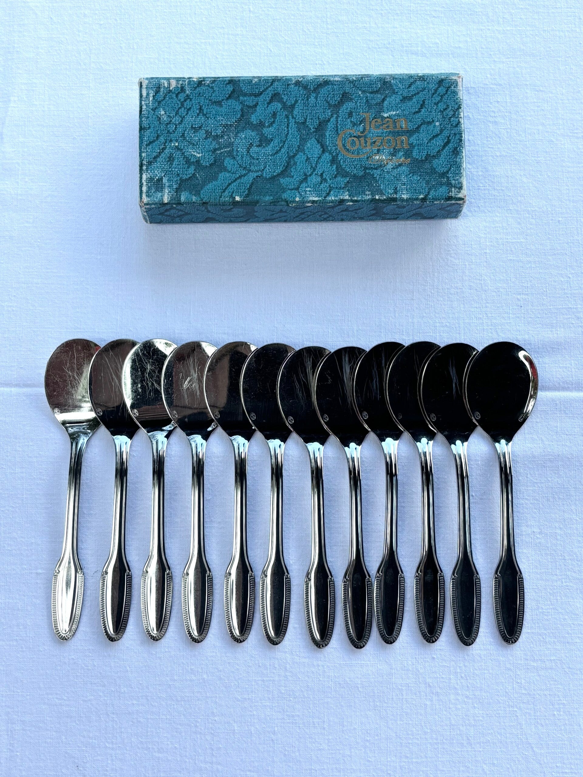 12 Verzilverde ijslepels van Jean Couzon - 12 Silver-plated ice cream spoons by Jean Couzon