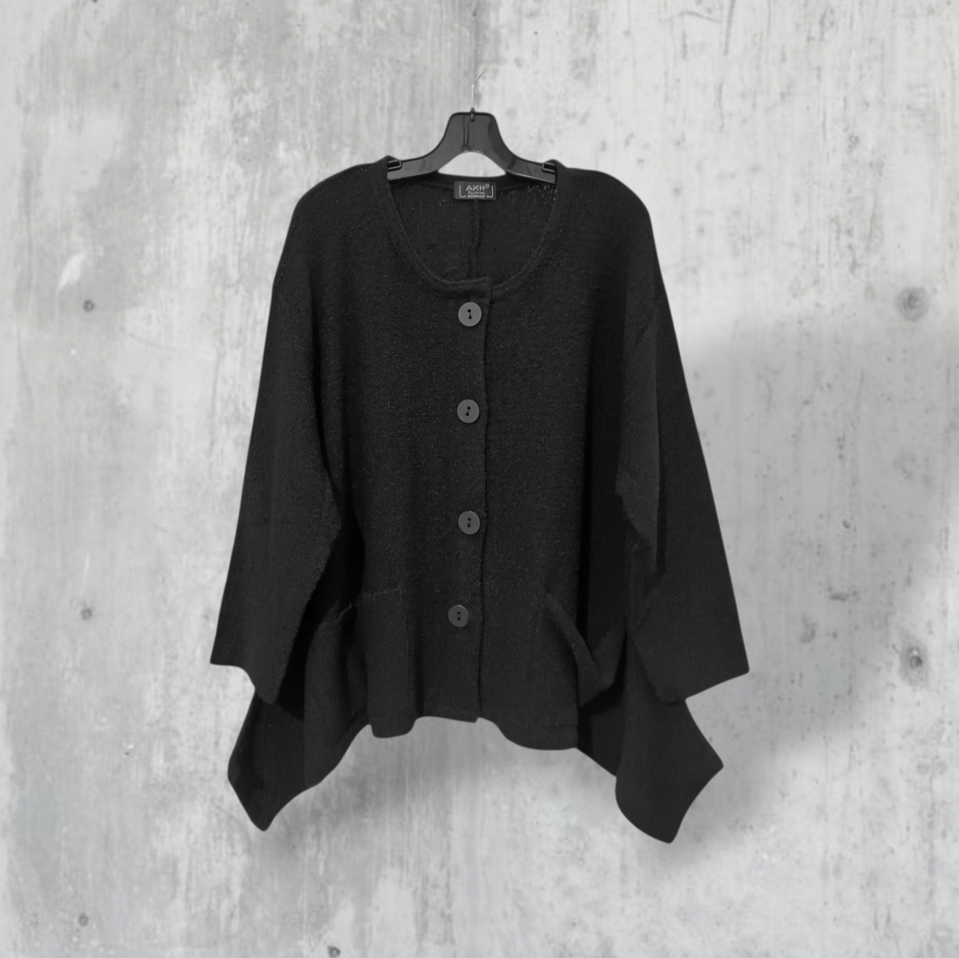 Strick Jacke kurz, in modischer A-Linie in schwarz