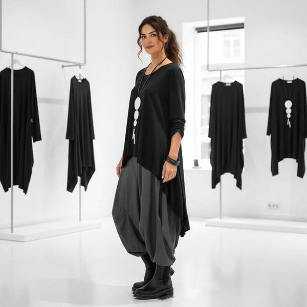 Oberteil vorne kurz - hinten lang in figurschmeichelnder A-Linie in schwarz