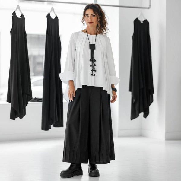 Bluse in modischer A-Linie mit effektvollen Biesen in weiß