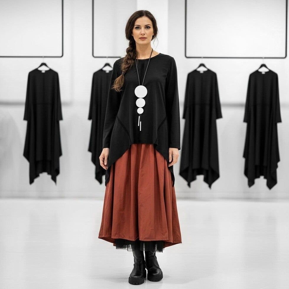 Oberteil in A-Linie mit zipfeligem Verlauf in schwarz