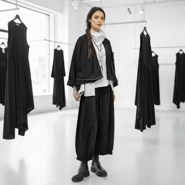 bequeme Palazzo Hose mit gekäuseltem Saumabschluss in schwarz