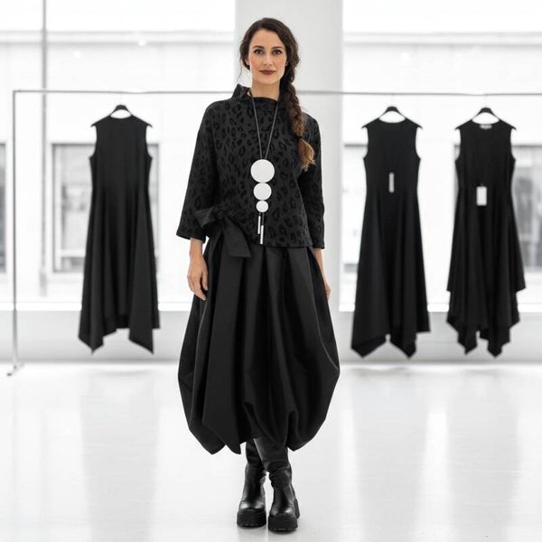 Oberteil in Kastenform mit kleinem Stehkragen in schwarz gemustert