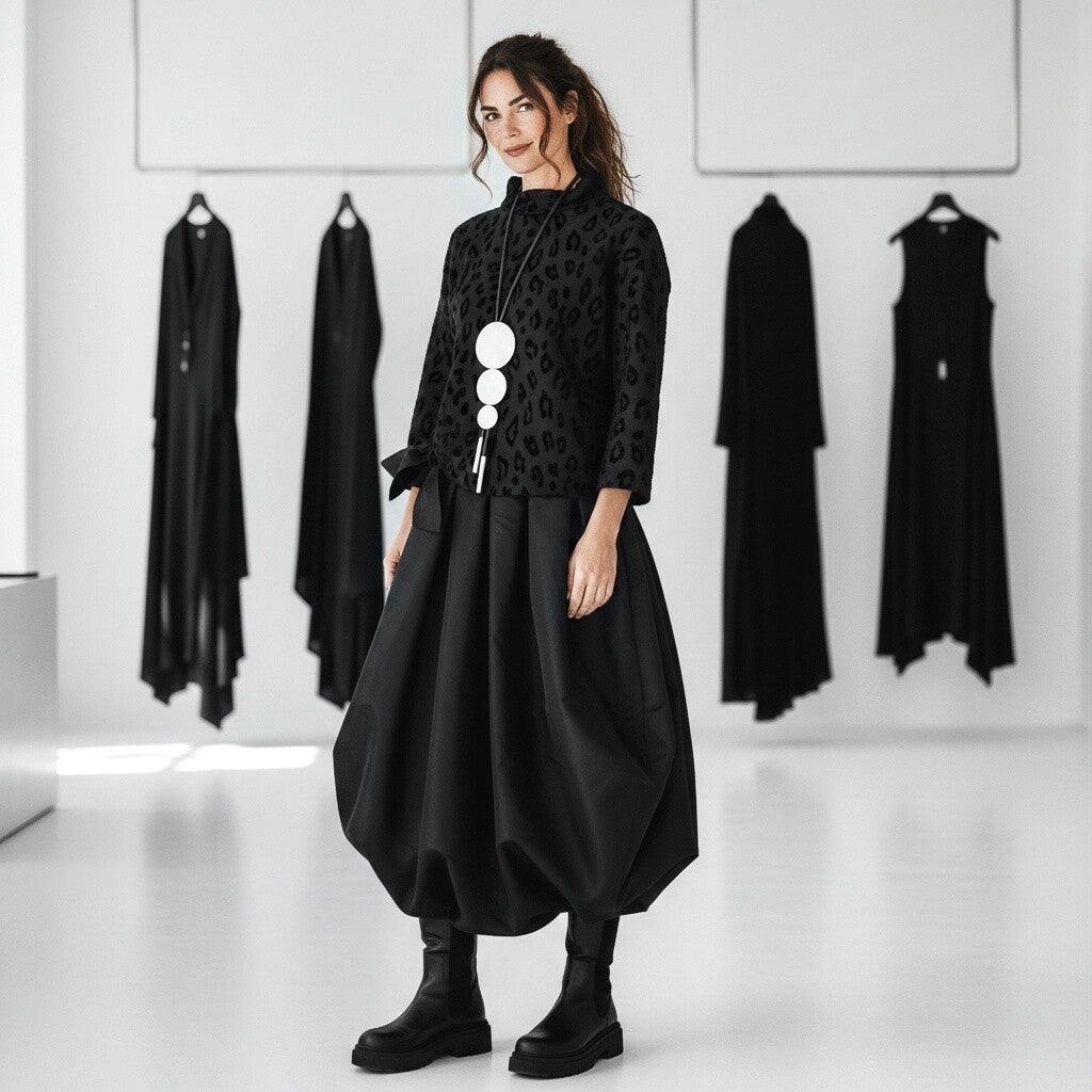 Taft-Rock mit Gummibund und effektvollem Raffsaum in schwarz