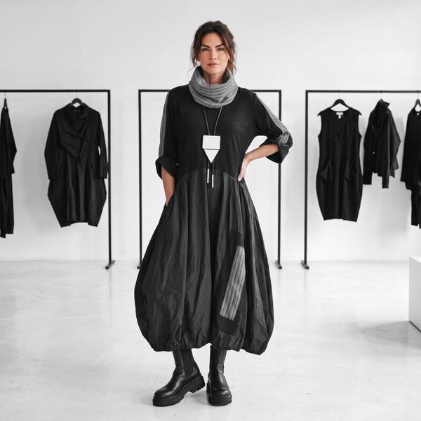 extravagantes Kleid in bauschiger Tulpenform mit effektvollen Ansätzen aus Memory Taft