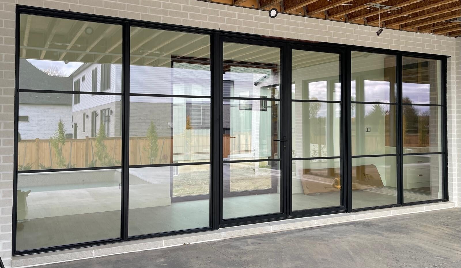 Clean modern windows and sliding glass doors with clear, streak‑free surfaces highlighting professional residential cleaning quality.