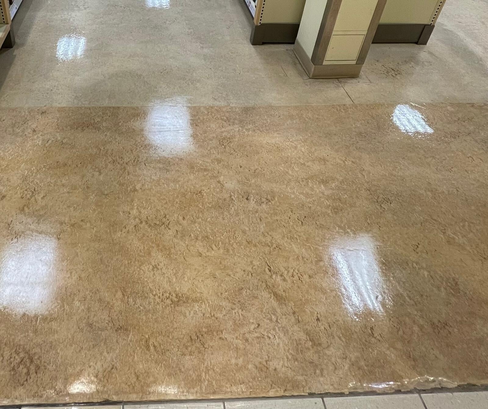 Polished commercial floors with a glossy, reflective finish showcasing professional deep‑cleaning and floor‑restoration quality.