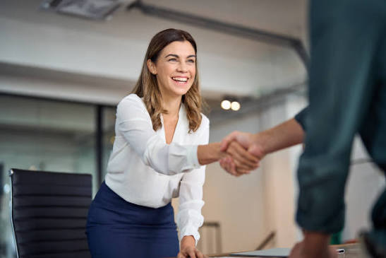 Client handshake and positive testimonials highlighting trusted, professional residential and commercial cleaning services in London, Ontario.