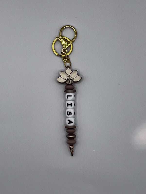 Sleutelhanger met naam ( HALVE BLOEM 1 )