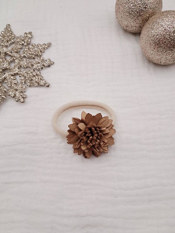 suède bloem op elastiek hazel