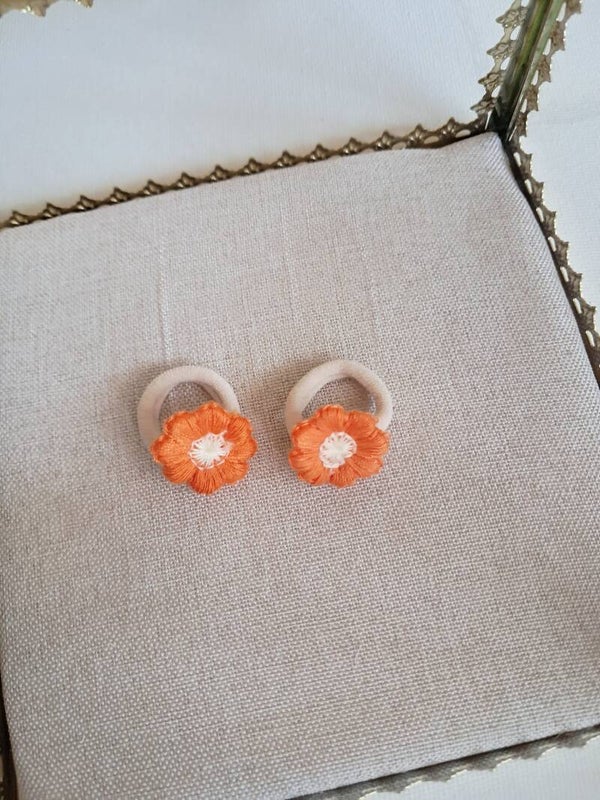 elastiekjes oranje bloemetjes