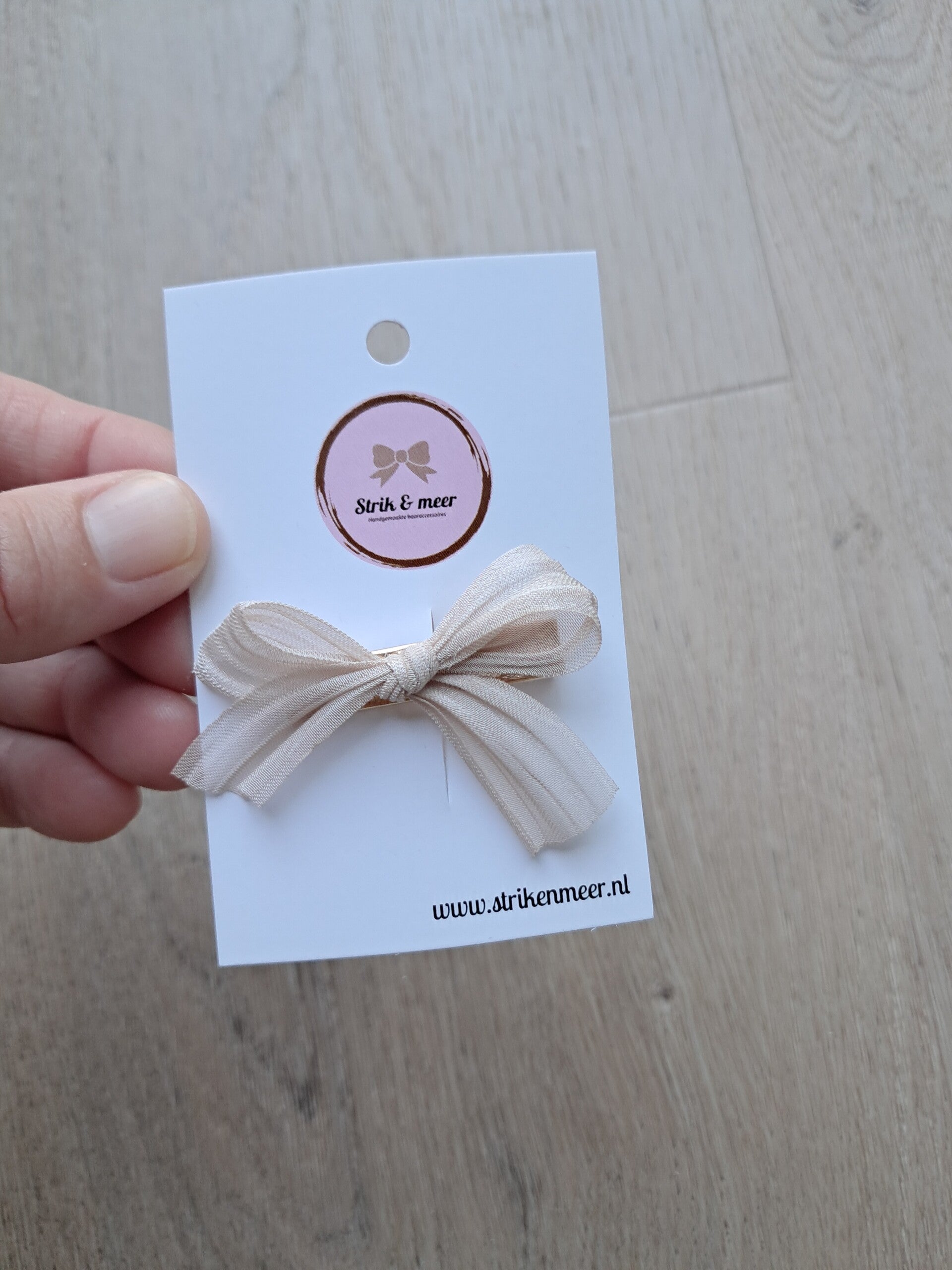 Strikje beige