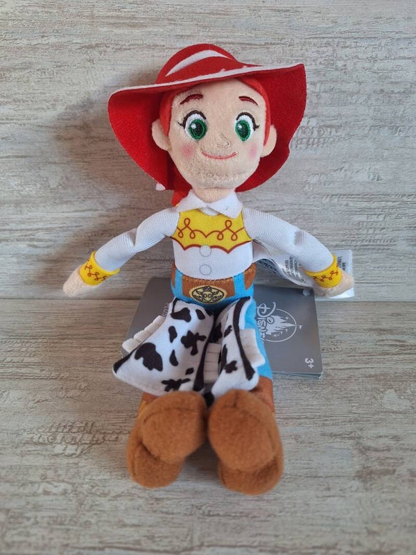 PELUCHE D'EPAULE DISNEYLAND PARIS "JESSIE"