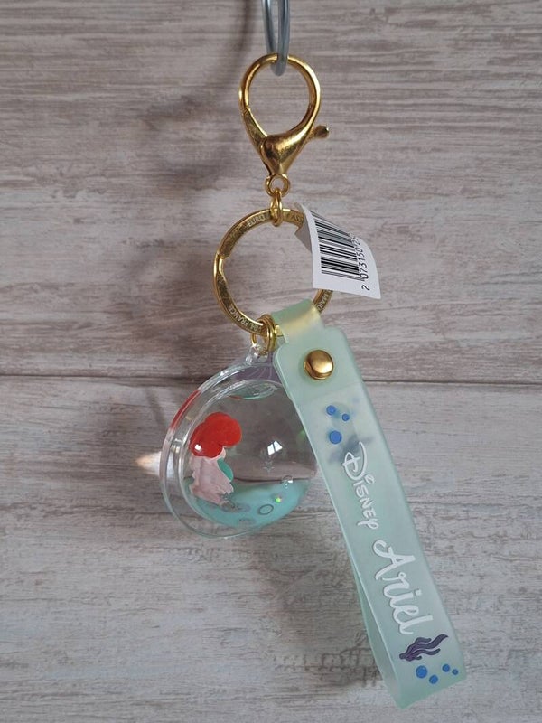 PORTE CLE FLOTTANT PRINCESSE " ARIEL ".