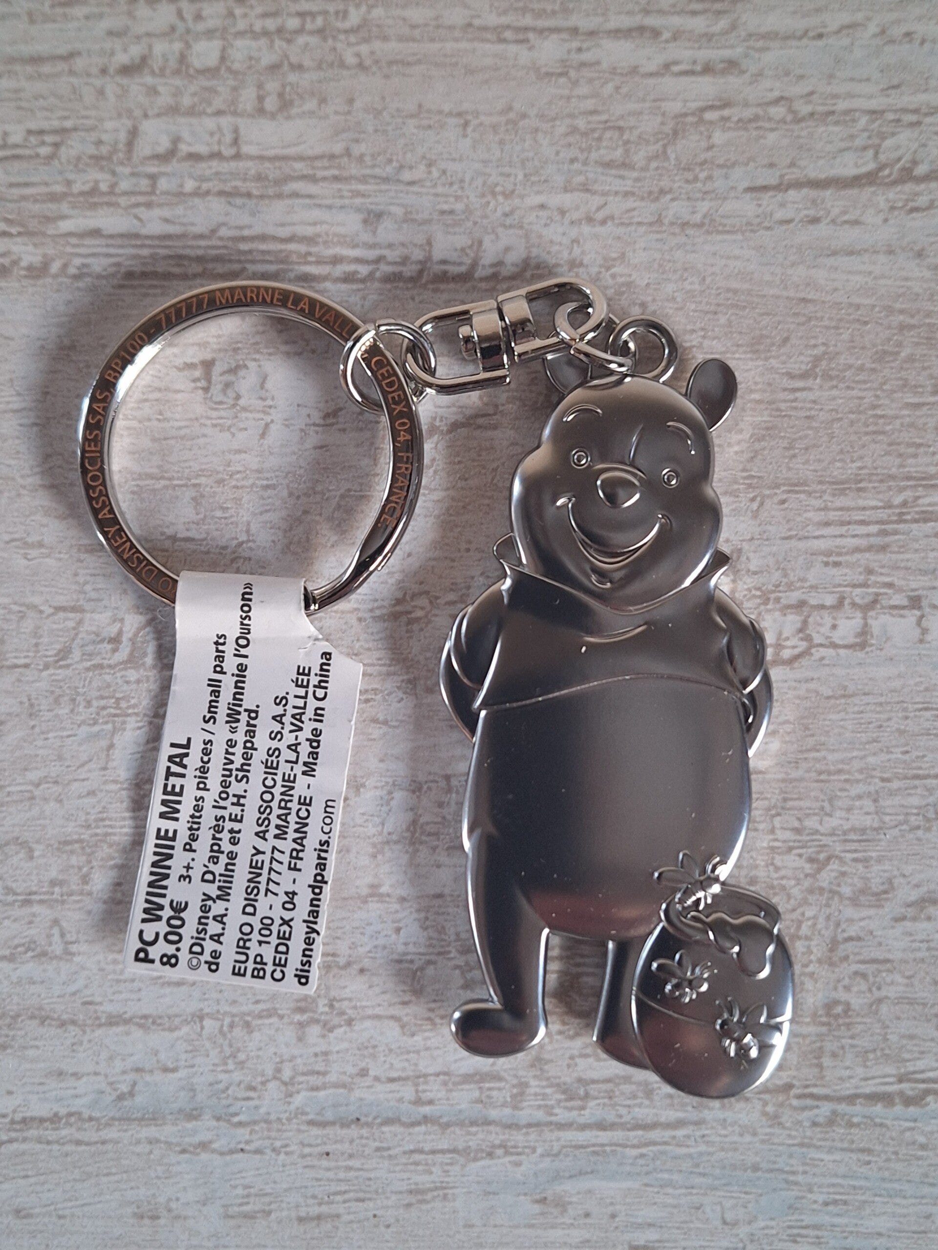 PORTE CLE " WINNIE L'OURSON " .